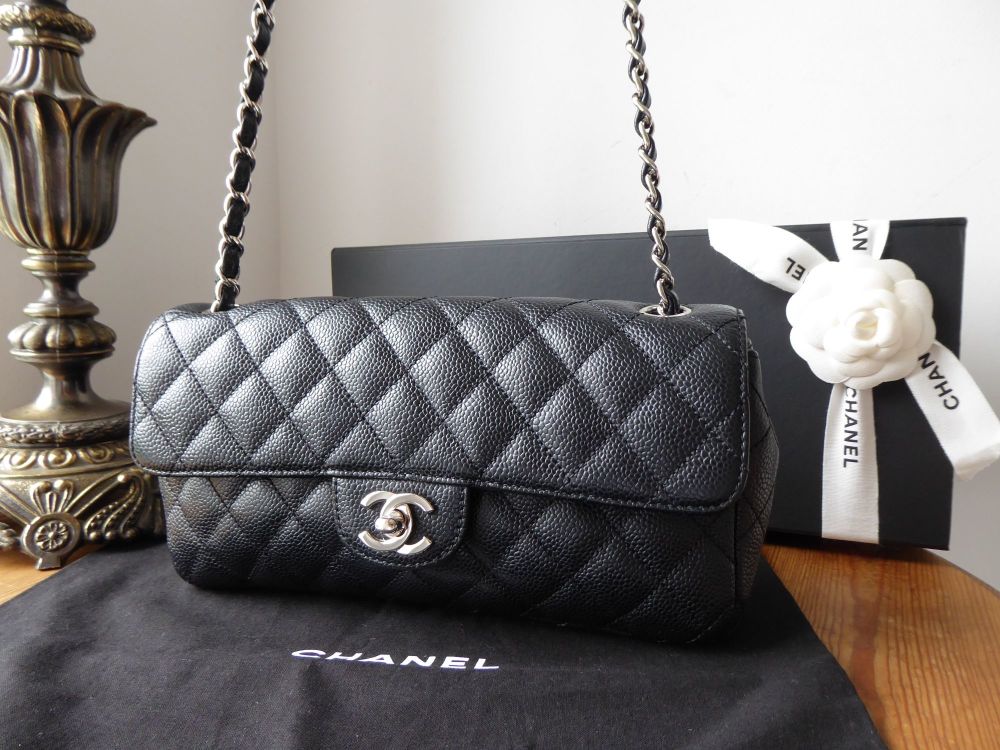 chanel classic black caviar bag