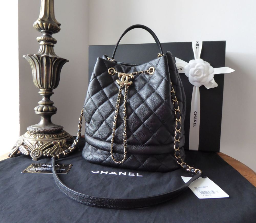 Chanel Rolled Up Drawstring Bucket Bag in Black Caviar with Gold Hardware -