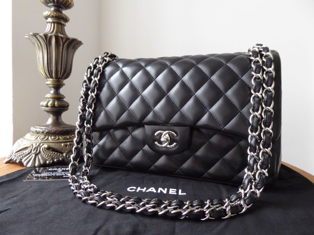 Chanel Chevron Quilted Classic Jumbo Double Flap in Black Caviar with  Silver Hardware - SOLD