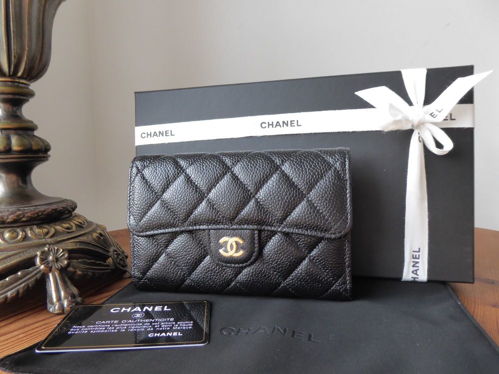 Chanel Classic Medium Flap Wallet in Black Caviar with Gold Hardware - SOLD
