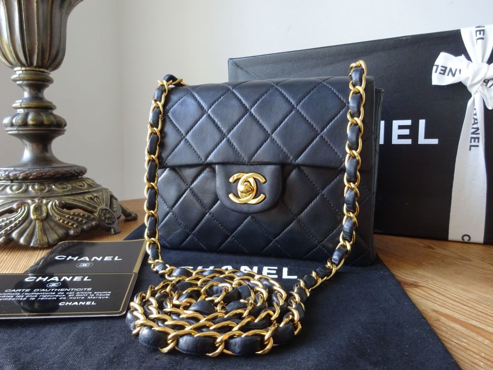 Chanel, Vintage mini black lambskin quilted handbag with gold