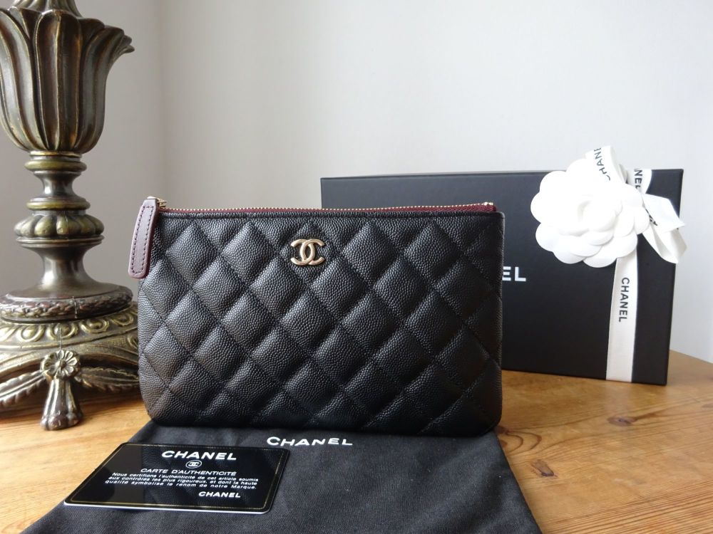 Chanel Small O Case in Black Quilted Caviar with Gold Hardware