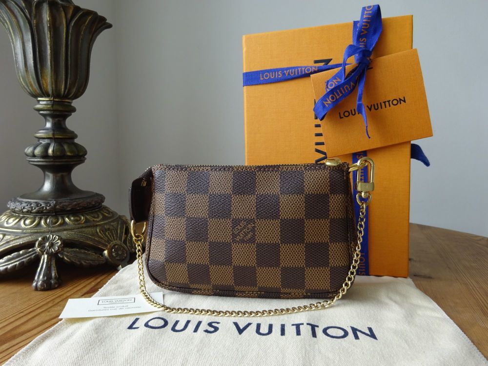 Authentic Louis Vuitton Mini Pochette Accessoires Damier Ebene