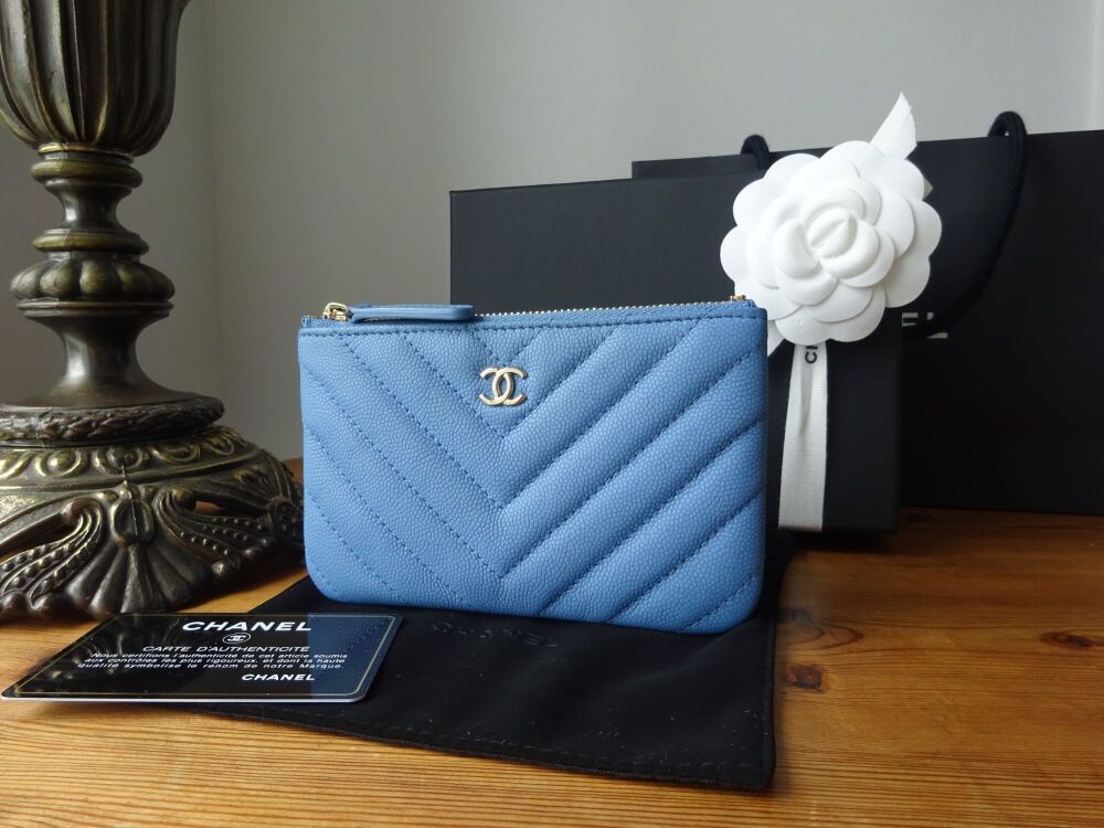 Chanel Mini O Case in Blue Chevron Quilted Matte Caviar with Champagne Gold