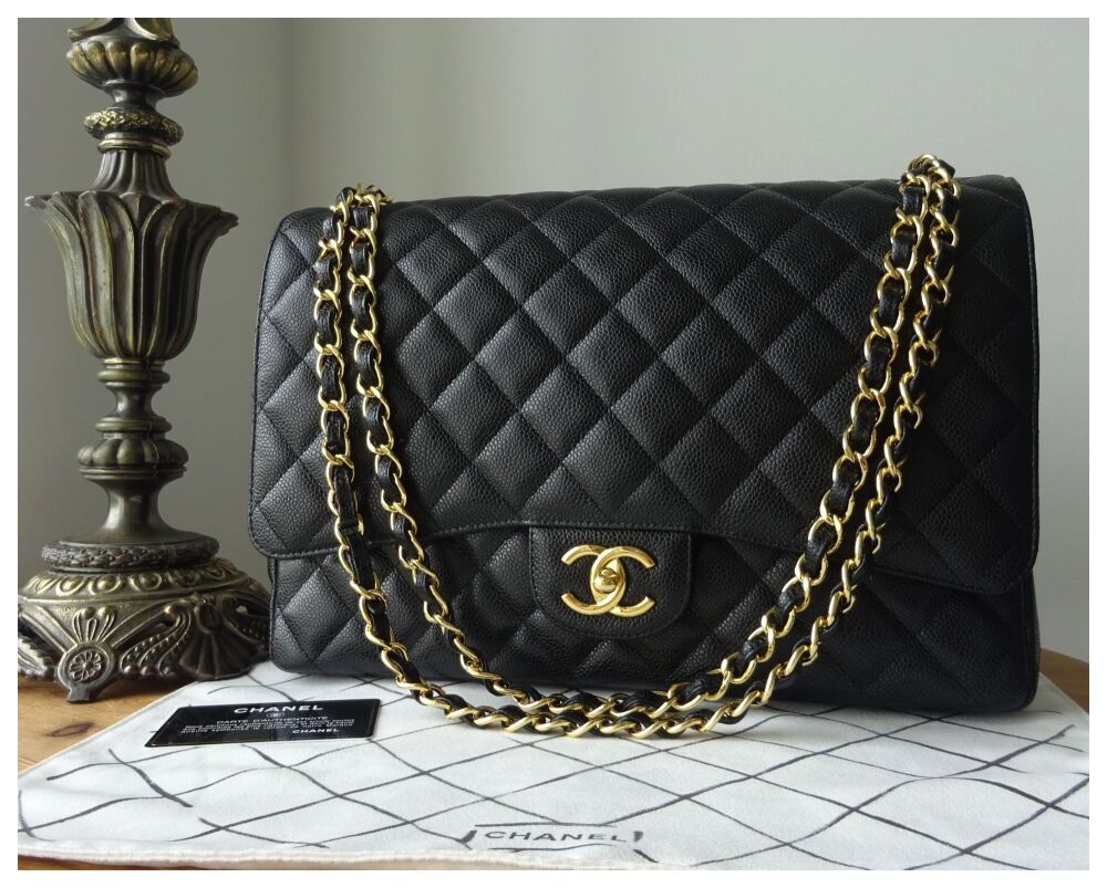 Chanel Classic Maxi Double Flap in Black Caviar with Gold Hardware