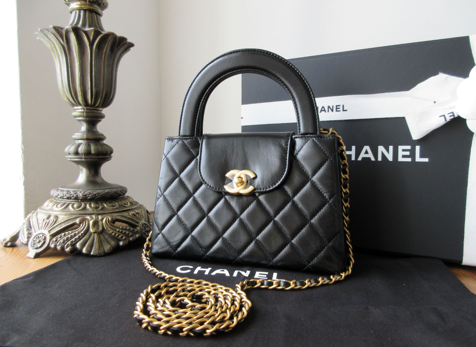 Chanel Kelly Handle Mini Re-Edition Shopping Bag in Black Shiny Aged Calfs