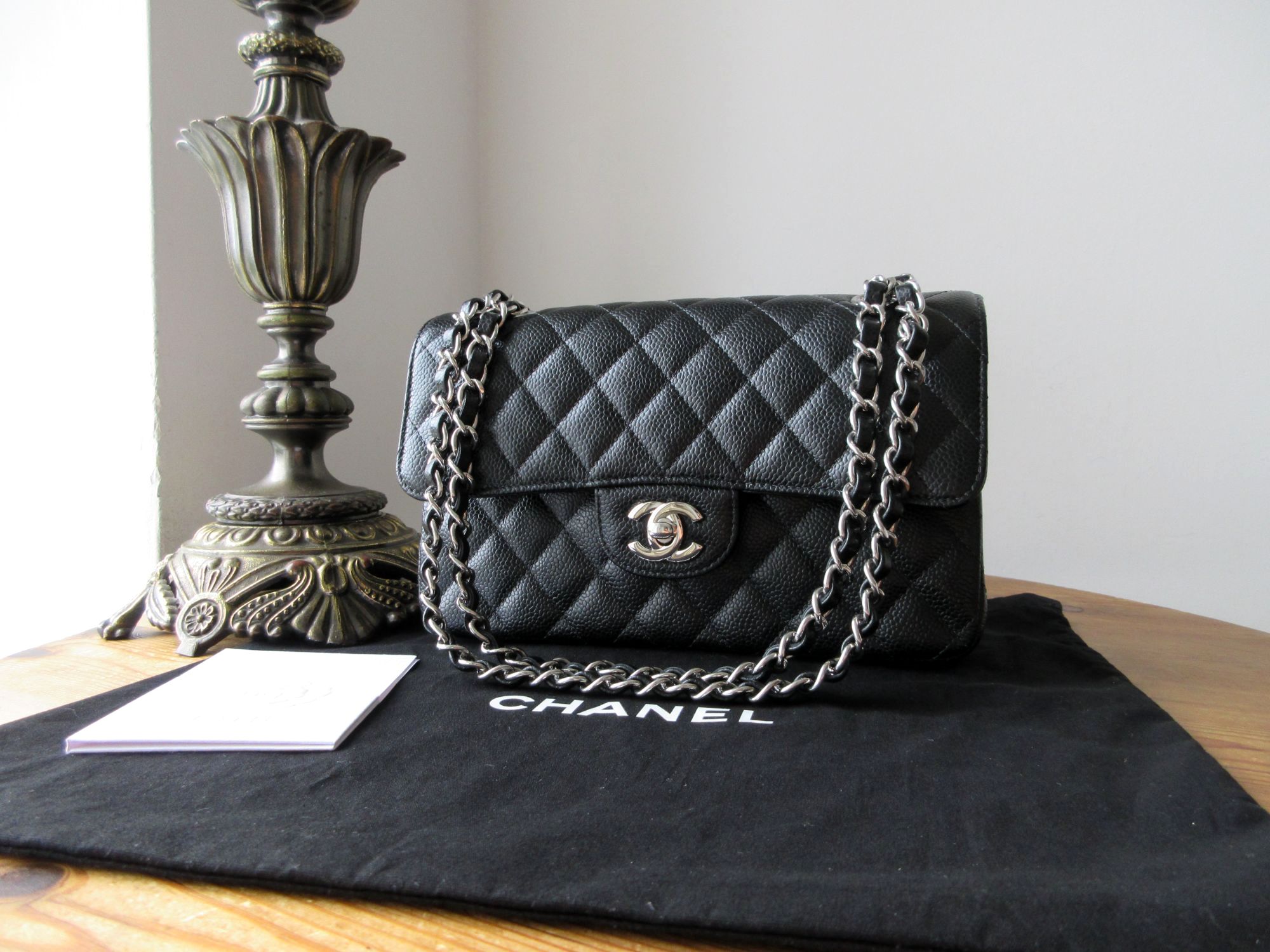 Chanel Timeless Classic Small Flap Bag in Black Caviar with Shiny Silver Ha