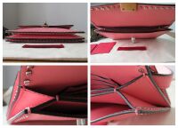 Valentino Garavani Micro Rockstud Small Turnlock Pochette in Rose Pink Smoo