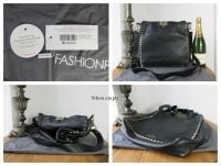 Valentino Garavani Rockstud Fliplock Crossbody Hobo in Black Pebbled Calfsk
