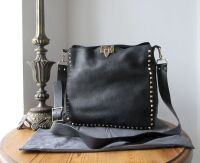 Valentino Garavani Rockstud Fliplock Crossbody Hobo in Black Pebbled Calfsk