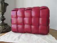 Bottega Veneta Padded Cassette Bag in Morello Cherry Intrecciato Lambskin