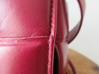 Bottega Veneta Padded Cassette Bag in Morello Cherry Intrecciato Lambskin