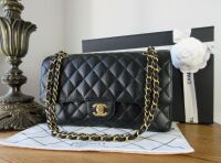 Chanel Classic Medium Double Flap in Black Caviar with 22K Gold Hardware