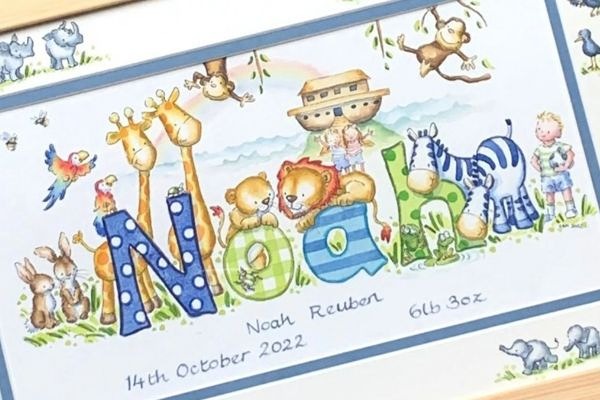 Personalised baby name artwork with illustrated animals, traditional watercolour nursery decor
