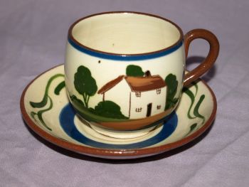 Watcombe Motto Ware Tea Cup and Saucer. (2)