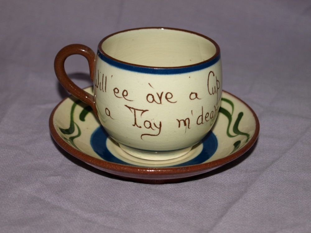 Watcombe Motto Ware Tea Cup and Saucer.