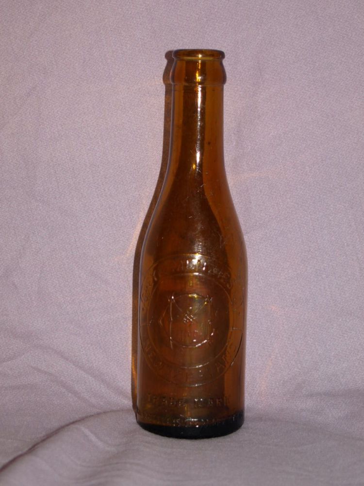 Grey and Menzies Ltd New Zealand Amber Glass Bottle.
