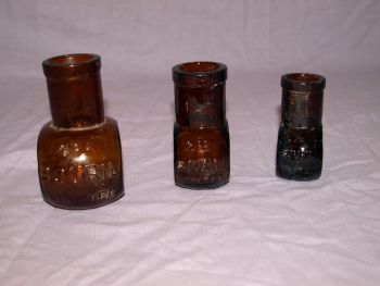 Antique Set of Three Amber Glass Bovril Jars. (4)