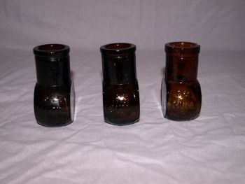 Antique Set of Three Amber Glass 2 oz Bovril Jars. (2)