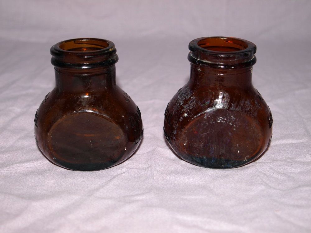 Antique Set of Two Amber Glass Bovril Jars.