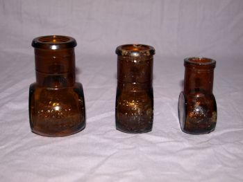Vintage Set of Three Amber Glass Bovril Jars. (2)
