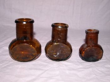 Vintage Set of Three Amber Glass Bovril Jars. (3)