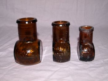 Vintage Set of Three Amber Glass Bovril Jars. (4)