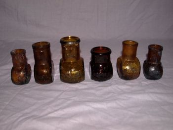 Antique Amber Glass Bovril Jars . (2)