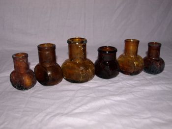Antique Amber Glass Bovril Jars . (4)