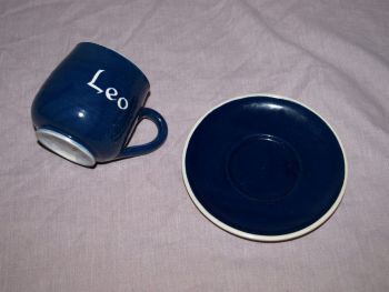 Rainham Pottery Cup and Saucer, Personalised &lsquo;Leo&rsquo;. (2)