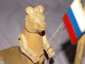 Carved Wooden Russian Bear and Flag Toy. (2)