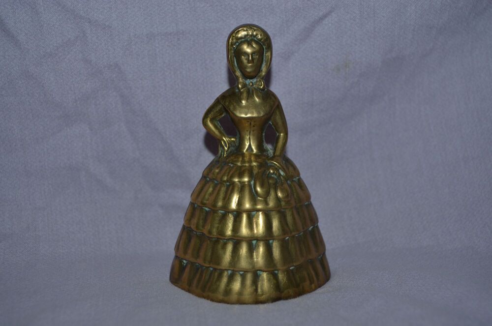 Brass Bell Lady in Crinoline Dress.