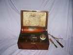 Griggs Conical Electro Magnetic Machine. 1873. Mahogany Case.