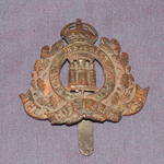 The Suffolk Regiment Cap Badge.