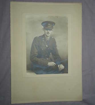 WW2 Large Photograph Soldier in Uniform Seated.  
