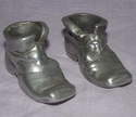 Pair of Pewter Boots.