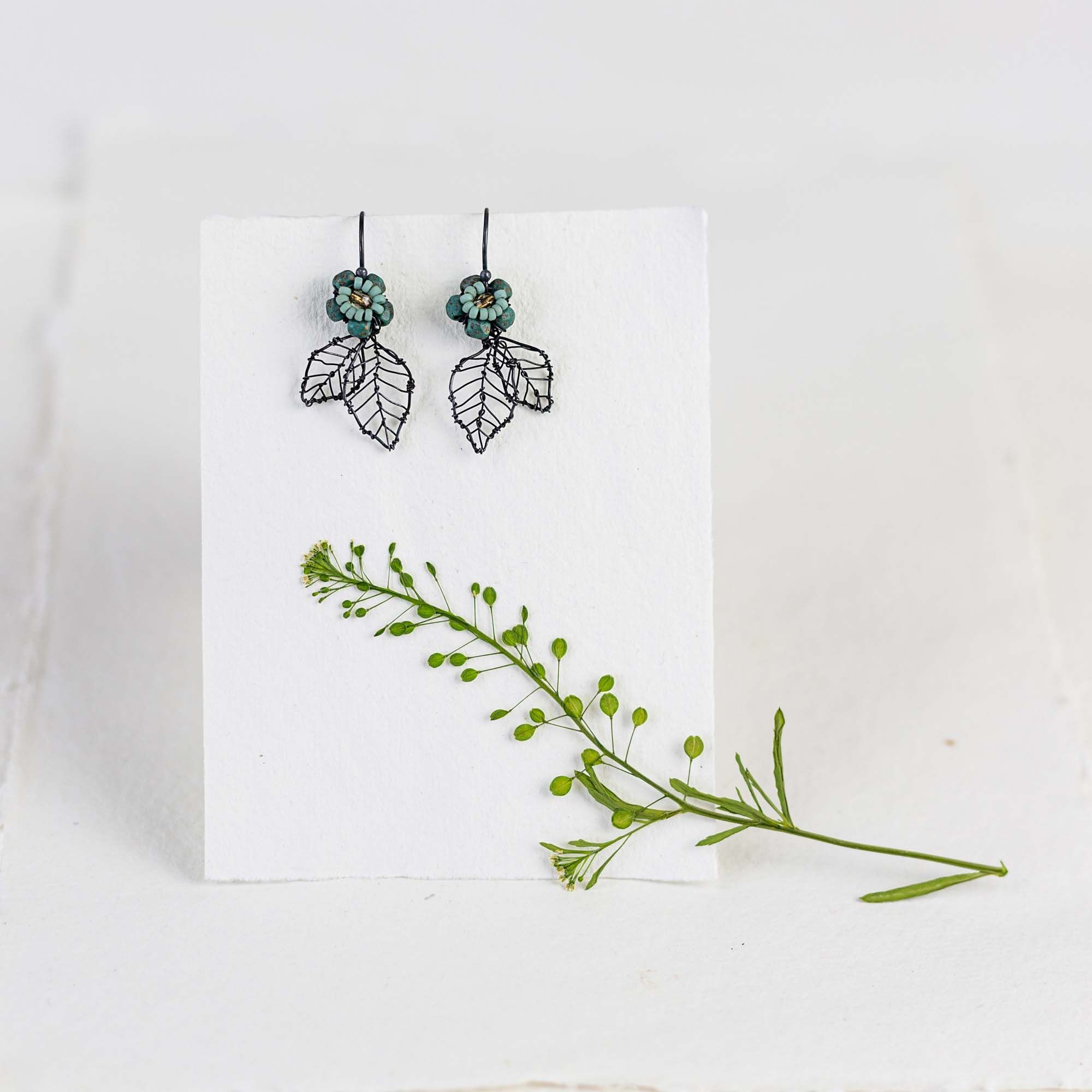 Handmade silver leaf earrings with beads