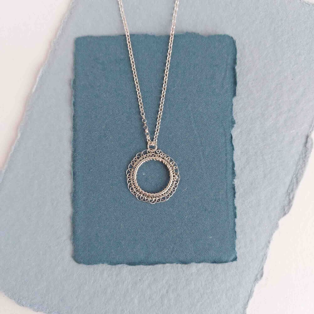 Stitched Silver Circle Pendant
