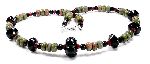 Proserpina - black glass melons and bicones with earthy green unakite disc beads