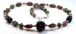 Lucina - black glass melon with unakite twisted oval beads and Swarovski crystals