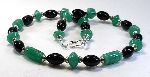 Proserpina - alabaster green lampwork beads with onyx and Swarovski crystals