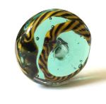 Transparent teal glass bead from Cirencester, with yellow and black cable twist appliedd