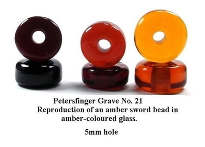 Sword bead in 'Amber' glass  - Petersfinger Grave 21