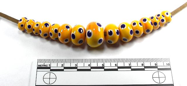 Handmade glass eye beads in yellow, blue and white, common to all time periods including Roman, Anglo-Saxon and Viking.