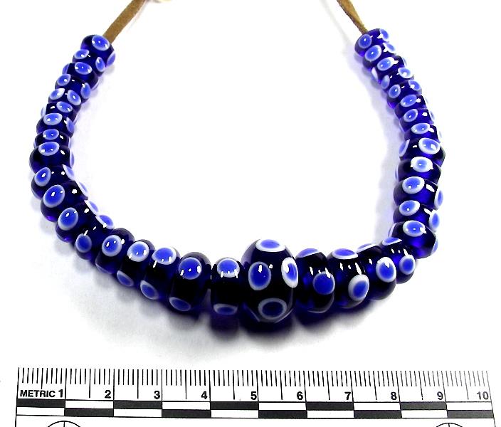 Handmade glass eye beads in cobalt blue and white, common to all time periods including Roman, Anglo-Saxon and Viking.