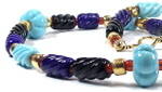 'Sekhmet' - Egyptian-inspired necklace in jet black, lapis blue and turquoise lampworked glass beads.