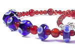 'Maire' - petite cobalt eye beads with carnelian accent beads