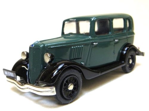 1934 FORD Y-TYPE FORDOR, GREEN OVER BLACK.