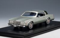 1 STAMP: 1985 CADILLAC ELDORADO BIARRITZ SEDAN, LIGHT SAGE METALLIC.