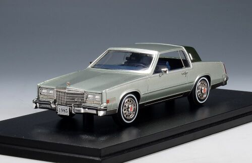 1 STAMP: 1985 CADILLAC ELDORADO BIARRITZ SEDAN, LIGHT SAGE METALLIC.